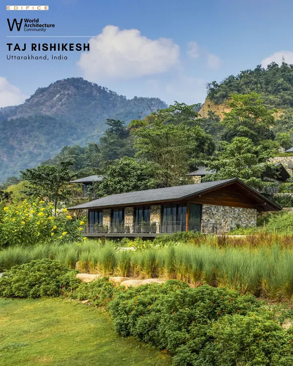 A stone-clad villa at Taj Rishikesh, nestled within the lush, green landscape of the Himalayan slopes. The design uses local materials and sits lightly on the land, preserving the natural context while offering guests a connection to the environment.