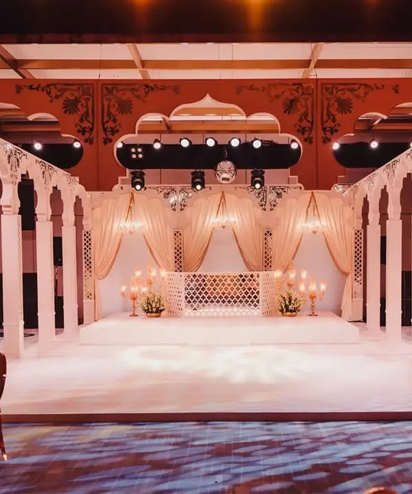 This is what I call a showstopper. For this engagement, we brought the magic of Rajasthan's mystical Mahals to life, creating an opulent palace courtyard that was nothing short of a royal gathering.