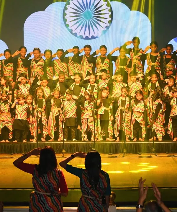 A powerful moment from our 'Sakhya 2025' concert, where our student choir performs a patriotic song, saluting in unison. This performance at the Royal Opera House was a culmination of months of dedication and teamwork.