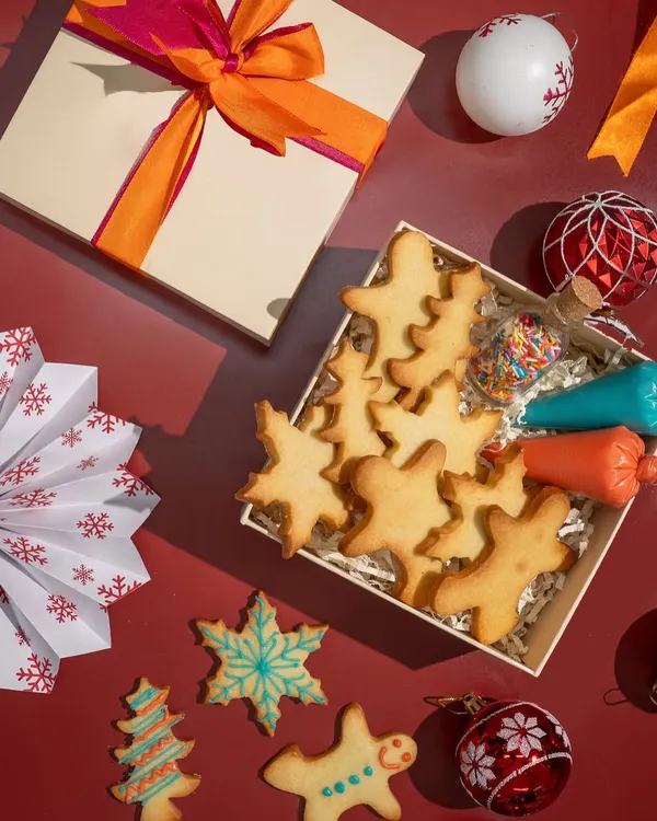 My DIY Cookie Kit is a super fun family activity. It comes with Christmas-themed sugar cookies, two piping bags of royal icing, and a jar of sprinkles for that magic touch.