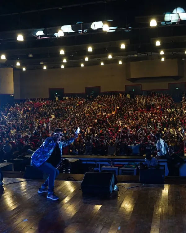 This is where I feel most at home, on a big stage, connecting with a massive, energetic audience. Capturing the electrifying vibe of a packed auditorium at IIT Bombay's Techfest is what I live for.