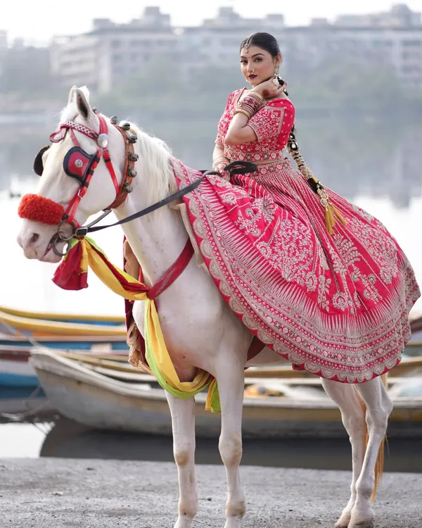 This is the complete bridal vision. I created a radiant and bold makeup look to match the grandeur of this beautiful red lehenga, ensuring my bride felt like royalty on her special day.