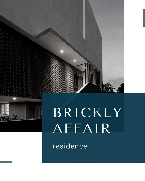 The 'Brickly Affair' residence at twilight. The warm illumination highlights the intricate pattern of the exposed brick facade, transforming the building into a glowing lantern and revealing its unique architectural texture.