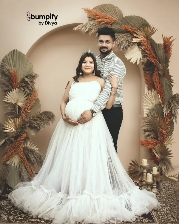 A queen awaiting her little prince or princess. This maternity session in my studio uses a beautiful boho theme with dried pampas grass to create a warm, earthy, and royal portrait for the mom to be.