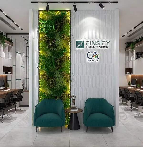 A 3D render of a vibrant CA office, featuring a central green wall that serves as a natural focal point. The design includes open-plan workstations and comfortable breakout seating to encourage interaction and well-being.