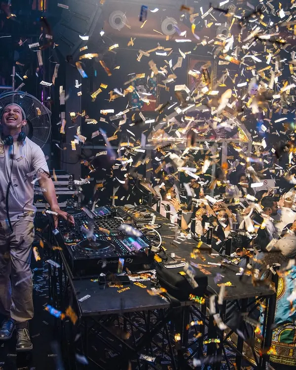 A confetti blast during my 10-year anniversary of 'Thursday Night Madness' at Happy Brew. It's been an incredible journey keeping the energy high at this residency for over a decade.