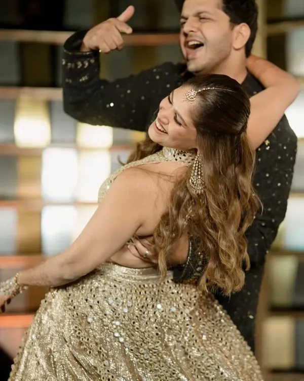 This is what pure joy looks like. I choreograph couple dances that are less about perfect steps and more about capturing the candid, happy moments between you two. This beautiful shot from a sangeet featured in Vogue India shows the energy and connection I aim to create.
