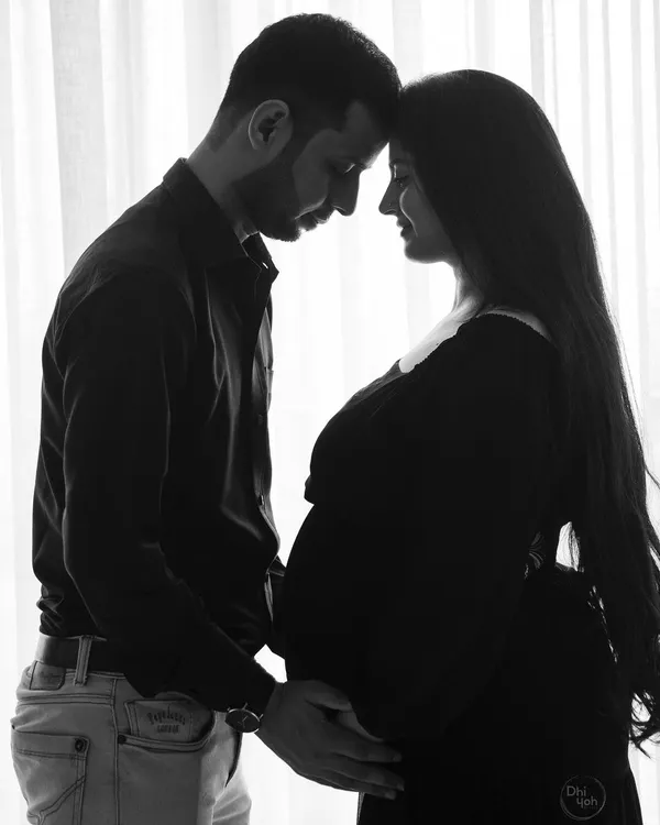 This silhouette is one of my favorite ways to create artistic black and white portraits. It focuses on the emotional connection and the beautiful shapes of the couple, creating a truly timeless piece of art.