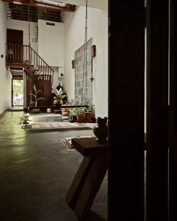 Redefining ancestral living, this 200-year-old home in the Sanskrit village of Mattur transforms a compact space into a grand narrative of light, warmth, and tradition.