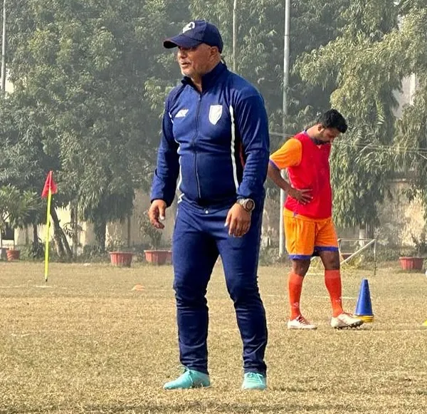 Our mentor, Keshav Sir, an AIFF instructor, providing guidance to our coaches during a training session.