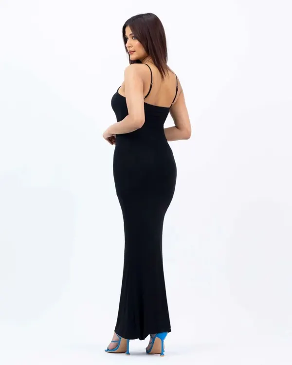 A back view of a model in a long black dress against a clean white background. This is a standard and essential shot for e-commerce, showing the fit and silhouette from all angles.
