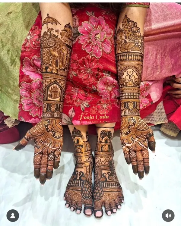 This is the ultimate bridal package. The design features coordinated elephant and palace motifs on both the hands and feet, creating a cohesive and regal look for the bride's special day.