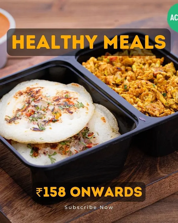A perfect example of a healthy and hearty breakfast. This meal features savory uttapam paired with spiced egg bhurji, providing a balanced start to your day with ample protein.