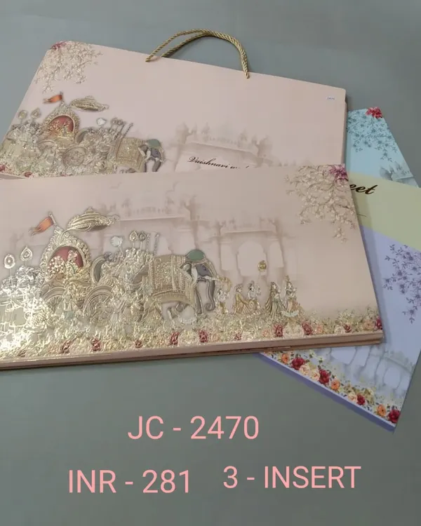 This invitation unfolds to reveal a magnificent baraat procession, detailed with gold foil and vibrant colors. The set includes a matching carry bag, perfect for presenting a grand wedding announcement.