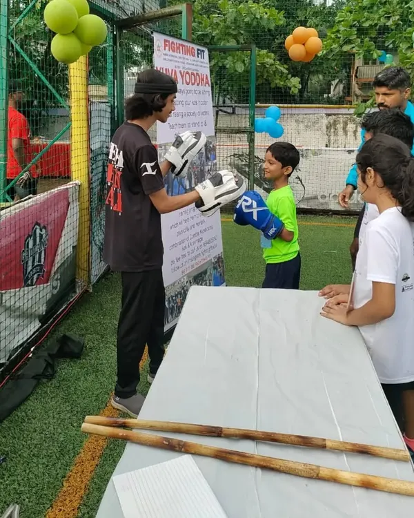 At the Bawajuniorthon event, teaching kids the basics of boxing. It's important to make learning about safety and fitness fun from a young age.