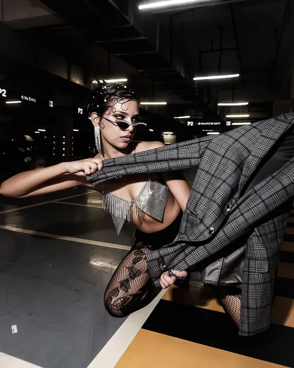 A variation of the parking garage shoot, with a slightly different crop and color grade, emphasizing the edgy, raw aesthetic.