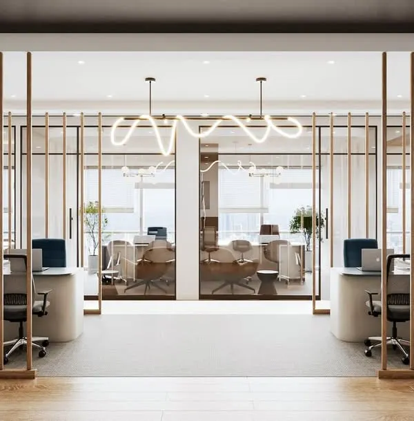 This luxury office in Mulund is a study in Japandi design, blending minimalist elegance with the warmth of natural wood. The wooden slat partition creates a sophisticated architectural feature while adhering to Vastu principles of openness, achieving a perfect balance of harmony and high-end design.
