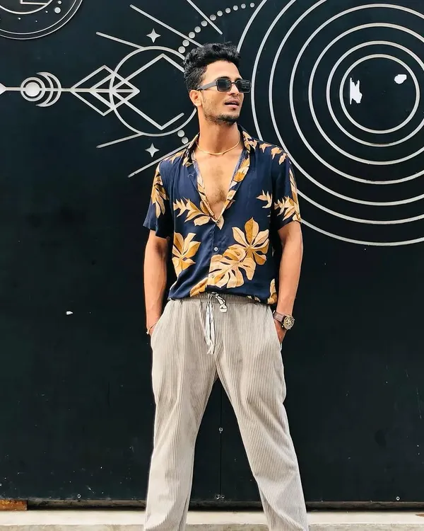A candid shot from a photoshoot. My personal style is a big part of my identity as a creative artist.