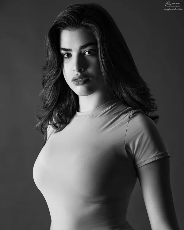 A portrait is more than just a picture. It's a feeling. I love creating these simple, dramatic black and white images that let your true self shine through with confidence and grace.
