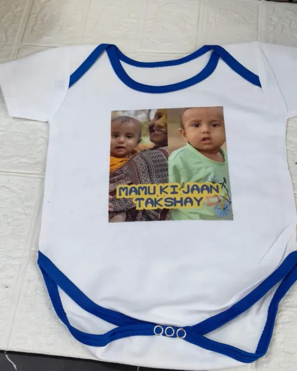 A custom-printed baby onesie featuring photos and the phrase "Mamu ki Jaan Takshay". A super cute and personal gift for a new baby in the family.