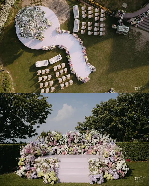 An aerial view of the pastel wonderland wedding in Mussoorie, showing the custom-curved aisle and circular mandap. The entire layout was designed to create a natural, flowing journey for the bride towards the ceremony.