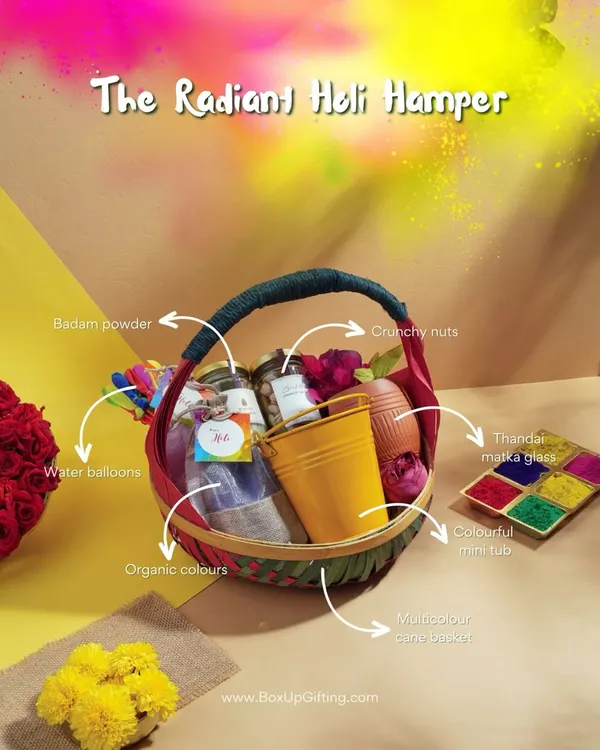Our "Radiant Holi Hamper" has everything you need for a vibrant celebration. It includes organic colours, crunchy nuts, badam powder for thandai, and even water balloons, all in a beautiful handwoven basket.