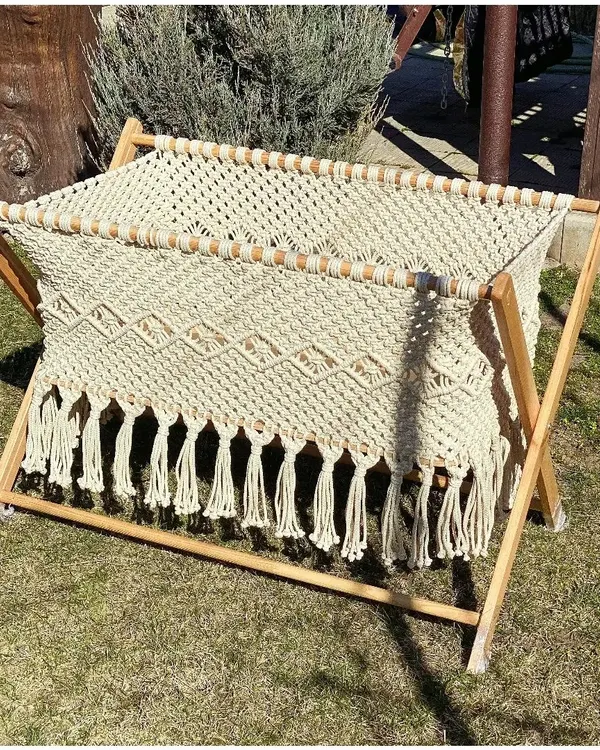 This is our wooden baby swing, designed for your baby's comfort and safety. It's a beautiful, traditional piece, handmade with soft cotton rope. As manufacturers, we offer it at half the price of other sellers.
