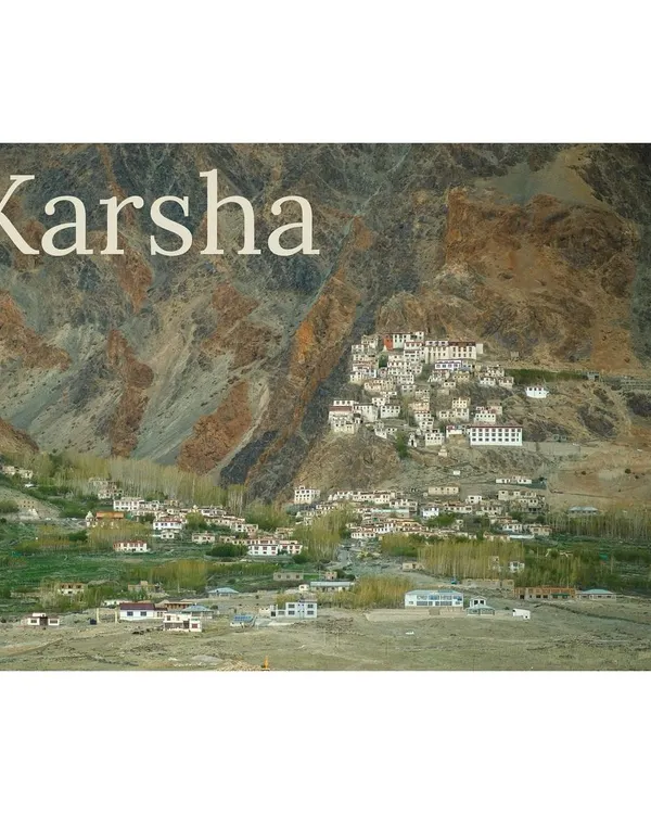 The Karsha Monastery in Zanskar Valley, appearing like a fortress clinging to the mountainside. This shot captures the scale and isolation of this incredible Buddhist gompa.