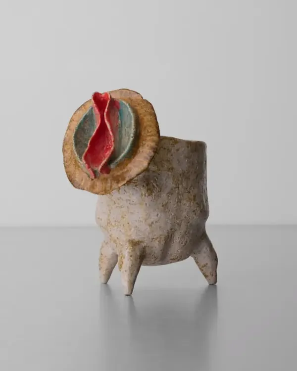 This stoneware cup, with a handle inspired by the feminine form, is part of my 'Erotic Cups' series. It challenges traditional ideas of tableware and celebrates boldness and the origins of life.