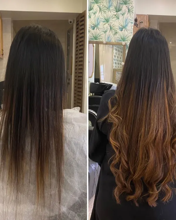 This is the transformation that dreams are made of. We took this client's hair from thin and lacking dimension to long, voluminous, and full of life with custom-colored extensions, finished with soft, glamorous waves.