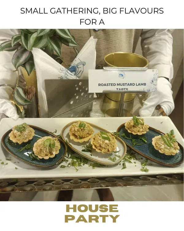 Small gatherings deserve big flavors. Here, our server presents Roasted Mustard Lamb tarts, a perfect bite sized appetizer for an exclusive house party.