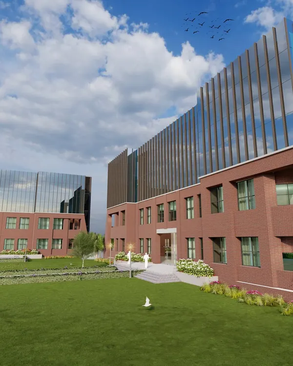 A perspective of the Greater Noida college campus, showing the two main blocks separated by a central green quadrangle. This layout fosters a sense of community and provides a tranquil space for students.