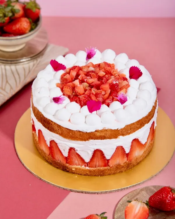 This Vanilla Fraisier has been a signature favorite for over three years. It’s made with a soft vanilla sponge soaked in strawberry goodness, and layered with a light mascarpone chantilly and fresh strawberries.