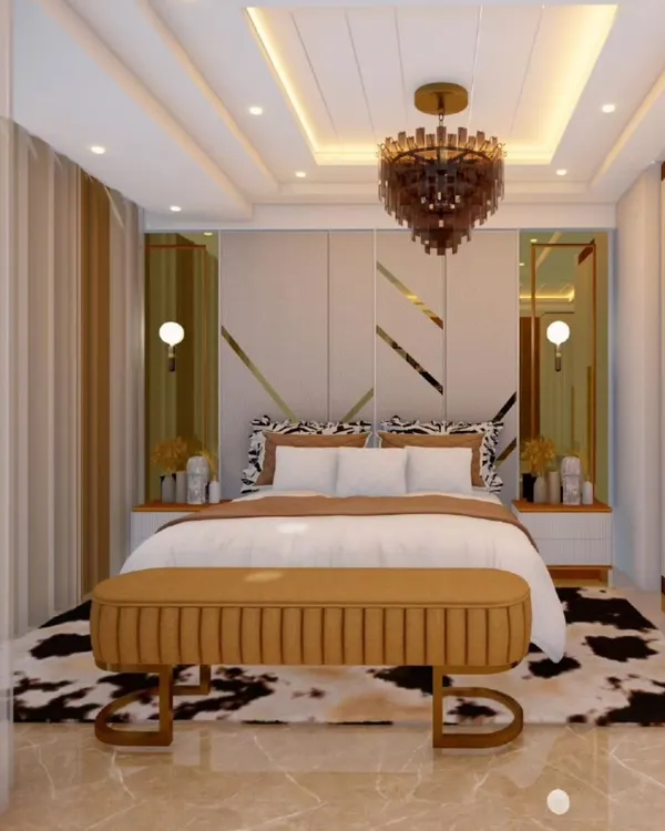 A 3D design for a luxurious master bedroom. This concept features a stunning chandelier, a custom headboard with metallic accents, and a layered lighting scheme to create a warm and inviting ambiance.
