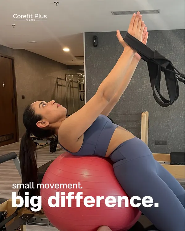 Small movement, big difference. This back extension on the stability ball, assisted by the tower, strengthens the entire posterior chain.
