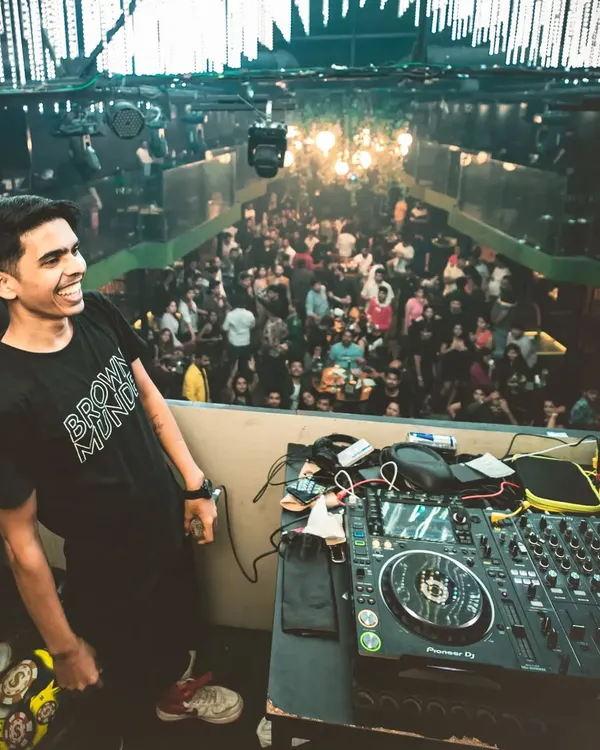 That moment of pure joy, looking out at a packed dance floor from the booth. This is why I do what I do.