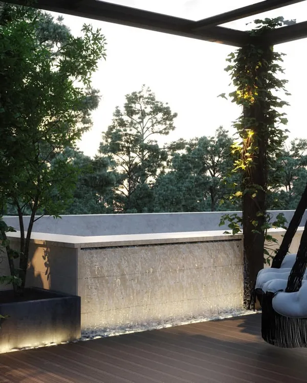 A serene rooftop terrace featuring a cozy swing chair under a pergola wrapped in climbing plants, creating the perfect spot for quiet relaxation.