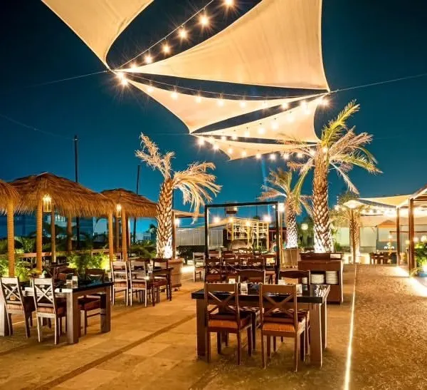 We transform spaces into breathtaking destinations. This stunning rooftop venue in Worli, with its panoramic city views and elegant, open-air design, provides the perfect canvas for us to create a memorable celebration under the stars.