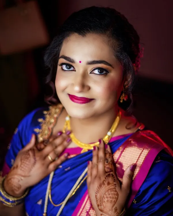 A beautiful portrait of the bride-to-be at her engagement ceremony, her smile radiating happiness.