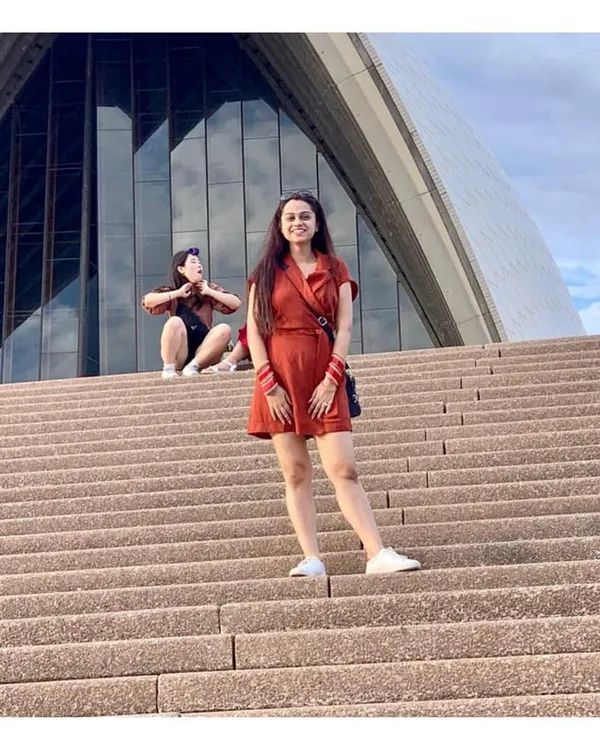 A stylish and comfortable romper is my go-to for a day of sightseeing. It's a complete outfit in one piece, easy to move in, and looks effortlessly chic, even when exploring an iconic location like the Sydney Opera House.