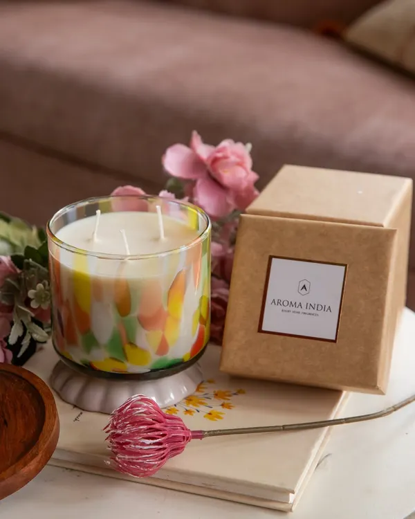This is one of my favorite artistic creations. The three-wick soy candle, housed in a vibrant, hand-finished glass jar, is a statement piece that brings both beautiful fragrance and a pop of color to your home. It comes ready to gift in a simple, eco-friendly kraft box.