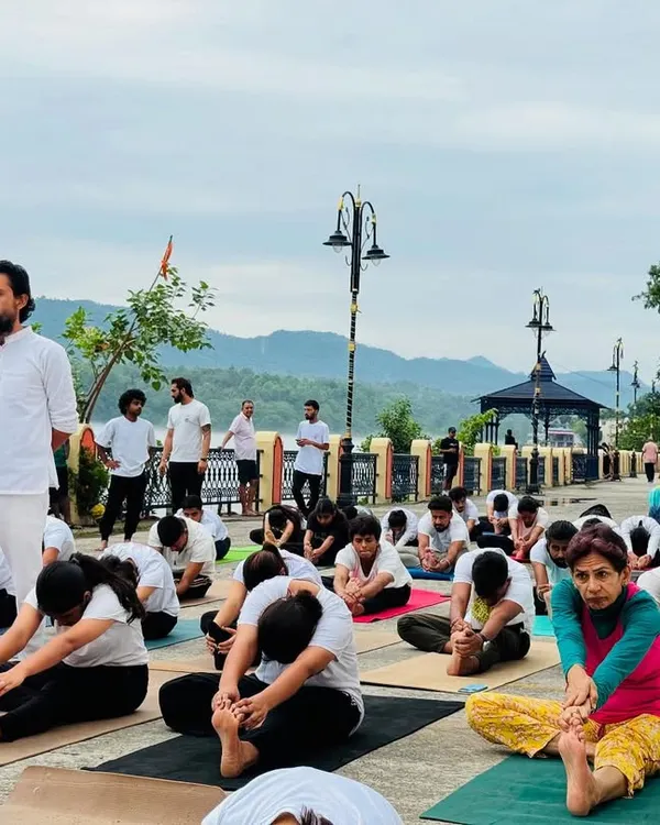 Practicing yoga outdoors connects us to the elements. Here, our students are in Janu Sirsasana during a special outdoor session.