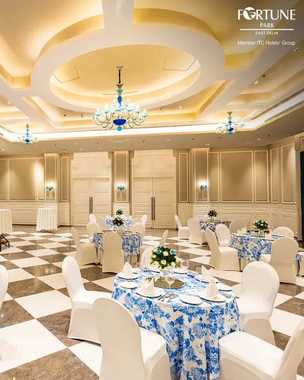 I believe every grand celebration deserves a breathtaking setting. My main banquet hall, with its magnificent chandeliers and classic checkered flooring, provides a truly elegant canvas for your most important life events, from weddings to milestone anniversaries.