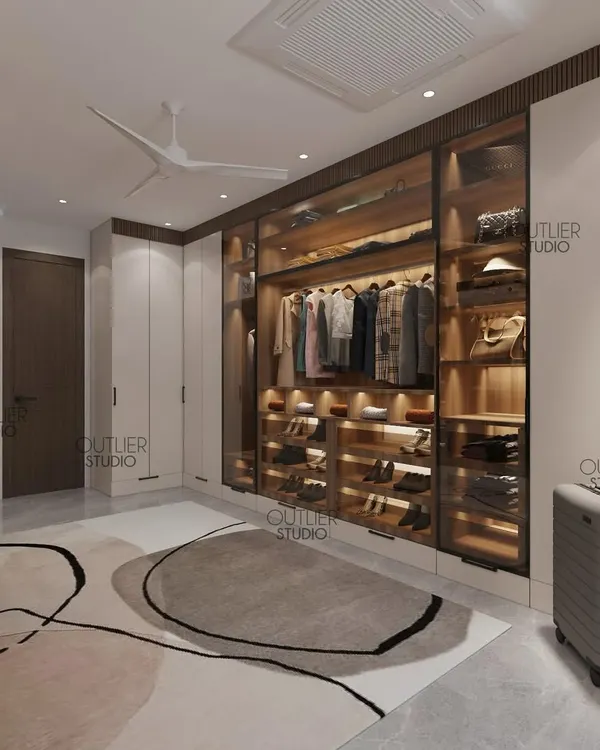 Elevate your everyday with this dreamy walk-in wardrobe design. The glass-fronted, backlit closets provide a beautiful and organized way to display your collection.