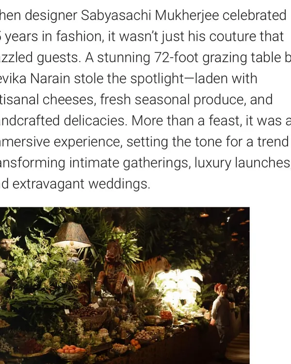 A proud feature in The Ideal Home & Garden magazine, mentioning the trend of extravagant grazing tables and citing the stunning 72-foot table at Sabyasachi Mukherjee's 25th-anniversary celebration as a benchmark for luxury events.