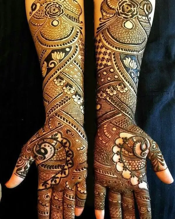 A classic full bridal design featuring a beautiful mix of paisleys, florals, and intricate line work, creating a rich and traditional look.