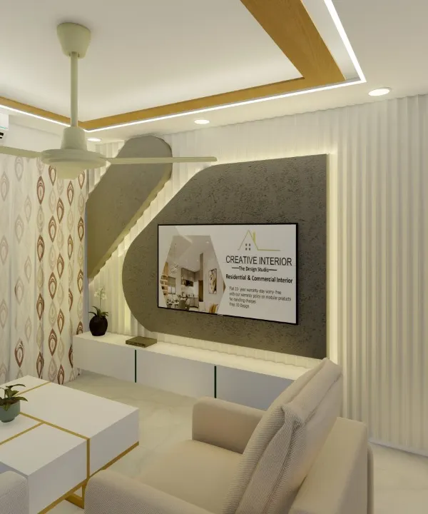 This living room features a custom TV unit with a textured background panel and integrated lighting. We used a neutral color palette with white furniture and gold accents to create a bright and modern living space.