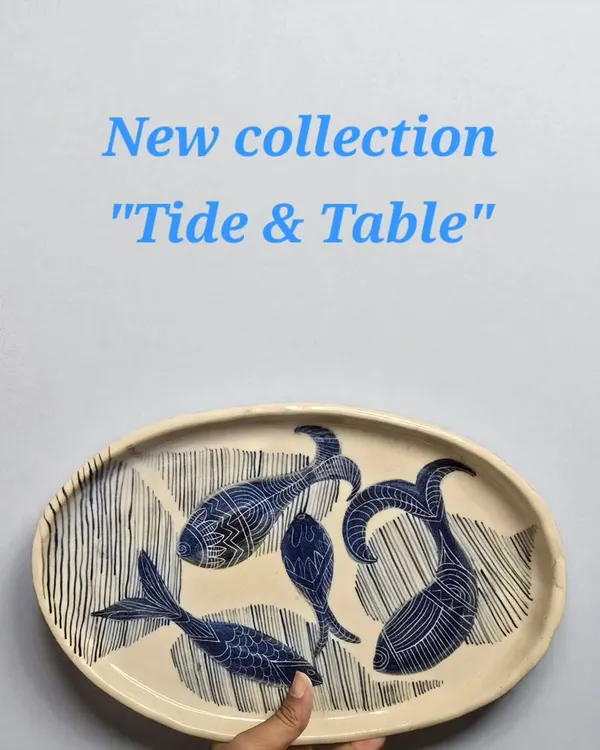 Introducing the "Tide & Table" collection, inspired by the ocean's rhythm. This hand-constructed and painted fish platter is a limited edition piece, designed to bring coastal elegance to your dining experience.