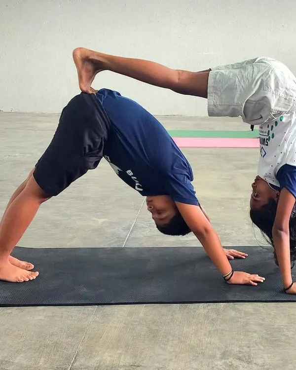Flexibility, fun, and friendship. Our young swimmers celebrate International Yoga Day with impressive acro yoga poses, building strength and trust together.