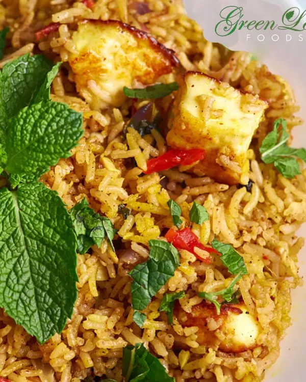 My Paneer Biryani is a fragrant and flavorful centerpiece for any main course. It's cooked with long-grain basmati rice, aromatic spices, and soft paneer, garnished with fresh mint.